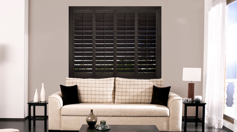 Fort Lauderdale living room with plantation shutters.